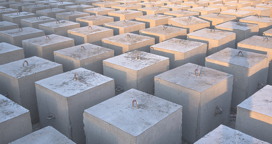 Background of many underwater Concrete Anchors mooring buoy Blocks in Industrial yard area, Symmetry view